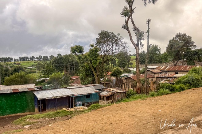 Nakuru County scenes : simple village below the highway, Kenya.
